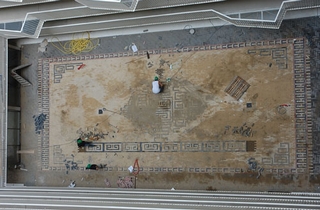 stratenmakers die tapijt leggen